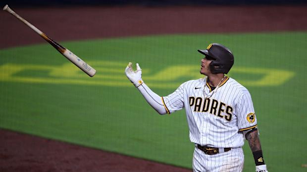 Sep 7, 2020; San Diego, California, USA; San Diego Padres third baseman Manny Machado (13) tosses his bat after grounding into a inning-ending double play during the seventh inning against the Colorado Rockies at Petco Park. Mandatory Credit: Orlando Ramirez-USA TODAY Sports